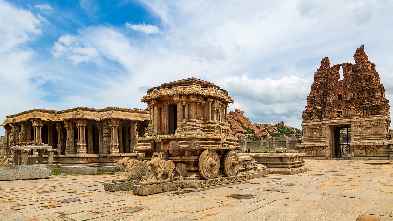 "Karnataka" comes from the Kannada words Karu Nadu (elevated land) or Kari Nadu (black soil land), describing the region's geography